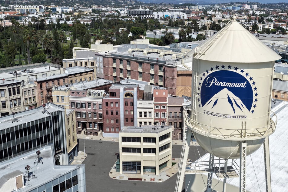 An aerial view of the Paramount logo displayed on the water tower at Paramount Studios on September 21, 2026. On Wednesday, a federal judge approved a settlement between Paramount and a group of states, clearing the way for its controversial buyout of Warner Bros.
