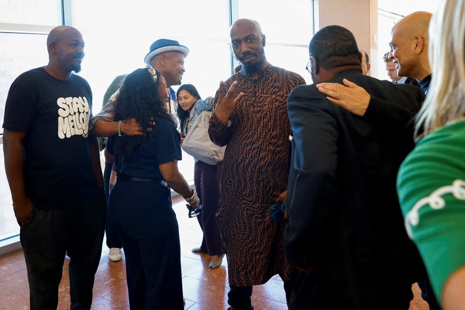 Friends and family of Tupac Shakur celebrate outside the courtroom after a jury found Duane "Keffe D" Davis (not pictured) guilty on August 31, 2026.