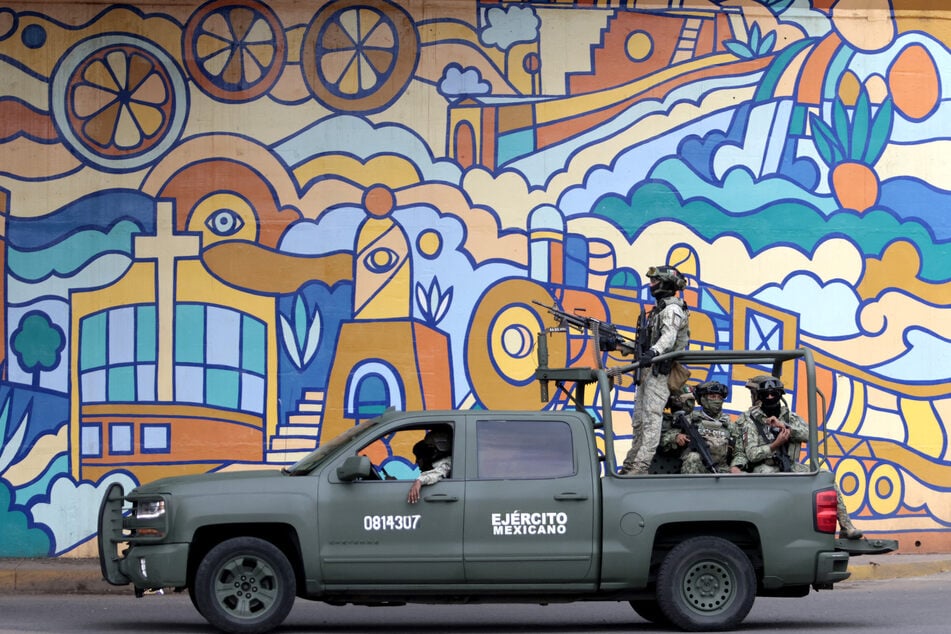 Mexican army personnel patrol amid a crackdown on organized crime gangs. The US Treasury Department has sanctioned nearly 50 suspected cartel members.