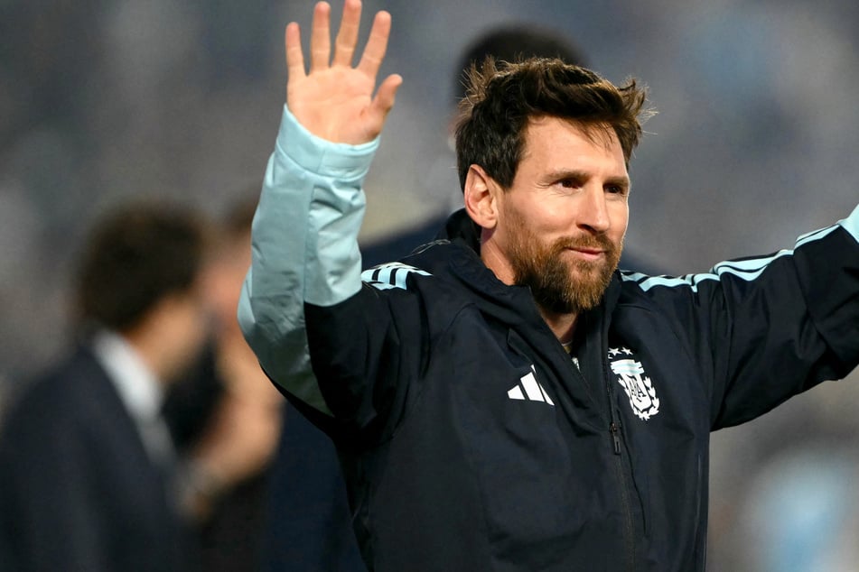 Lionel Messi waves to fans during a tribute to him after his final game with Argentina's national soccer team on Tuesday. He described it as the "saddest day of my career."