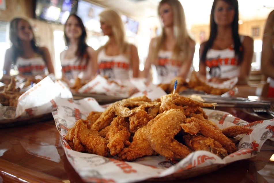 Chicken wings and scantily clad waitresses are the hallmarks of Hooters.