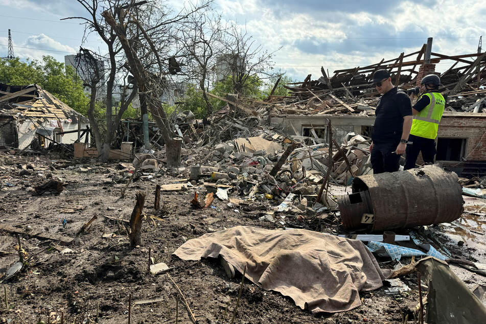 A Russian-guided bomb strike on the city of Kharkiv hit an apartment building, killing two people and injuring more than 50 on Saturday.