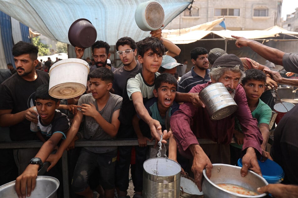 Crowd crush at Gaza aid center kills at least 20 as witnesses report Israeli gunfire