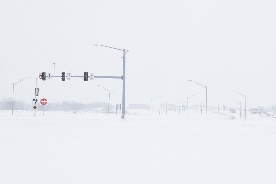 Thick snow covers an intersection in Des Moines, Iowa, on January 9, 2024.