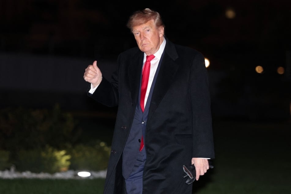 President Donald Trump flashes a thumbs up. The president on Saturday announced Audi's plan to build its first US auto plant for a stunning $4.2 billion.
