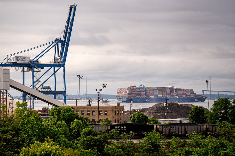The Baltimore shipping lane blocked for more than two months after a cargo ship collided with a major bridge in March, sending it crashing into the water, fully reopened on Monday, authorities said.