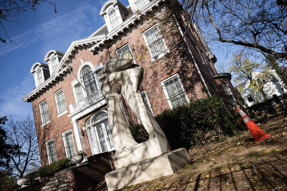 The former Syrian embassy is seen behind locked gates in Washington, DC on November 14, 2025.