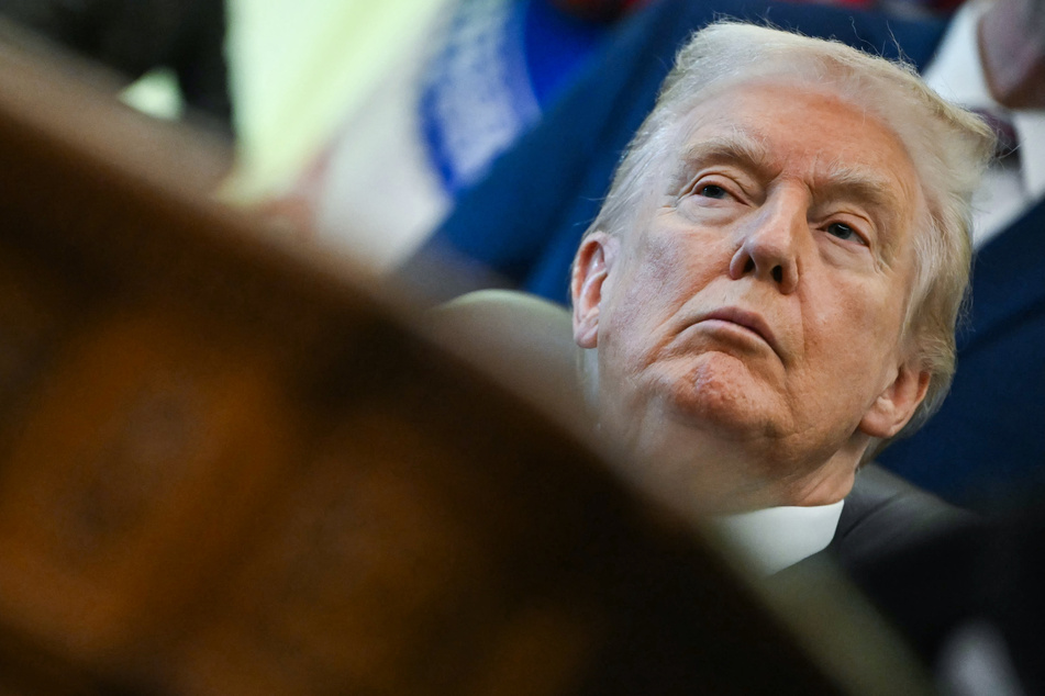 Trump says he is "open" to considering lifting Iran sanctions