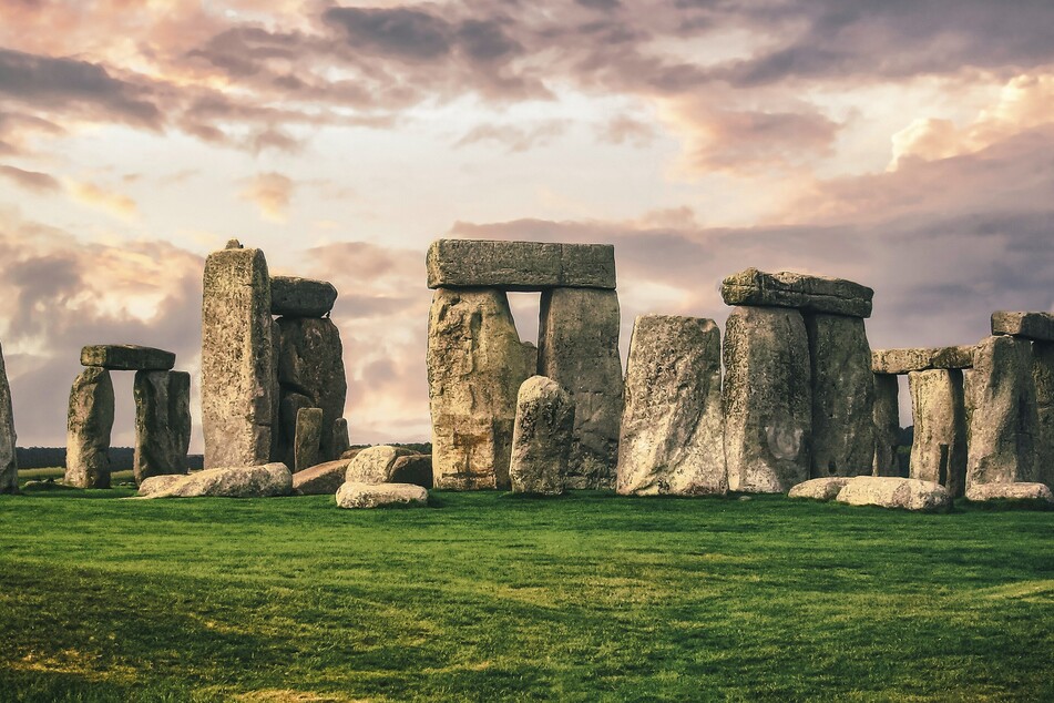 A central stone of the famous Stonehenge monument in southwest England came from 750 kilometers away in northeast Scotland, surprised scientists said Wednesday.