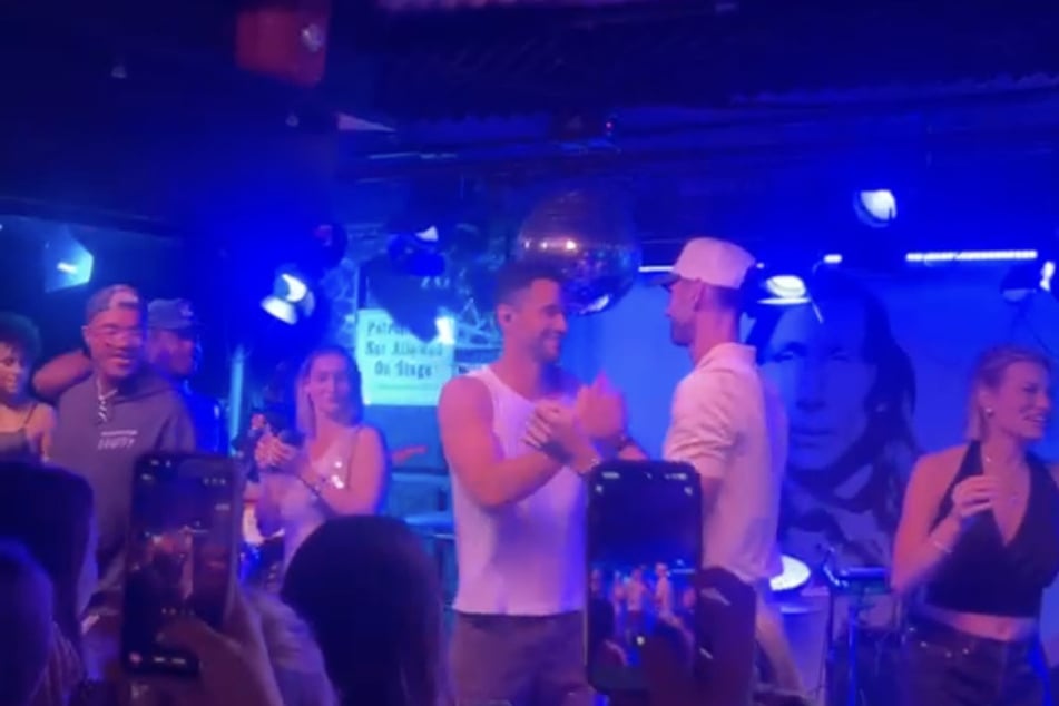 The cast of Summer House, along with Taylor Swift's backup singer Melanie Nyema (l.), were spotted on stage with Jesse Solomon in Amagansett, New York, on August 23, 2026.