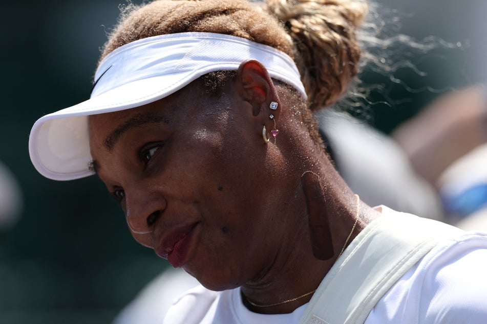 ADRIAN DENNIS / AFP Photo by ADRIAN DENNIS / AFP US player Serena Williams practices on court 12 at The All England Lawn Tennis and Croquet Club in Wimbledon, southwest London, on June 27, 2026, ahead of the 2026 Wimbledon Championships