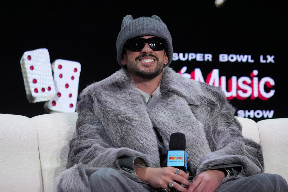 Bad Bunny speaks during a Super Bowl LX halftime show press conference at the Moscone Center in San Francisco, California.