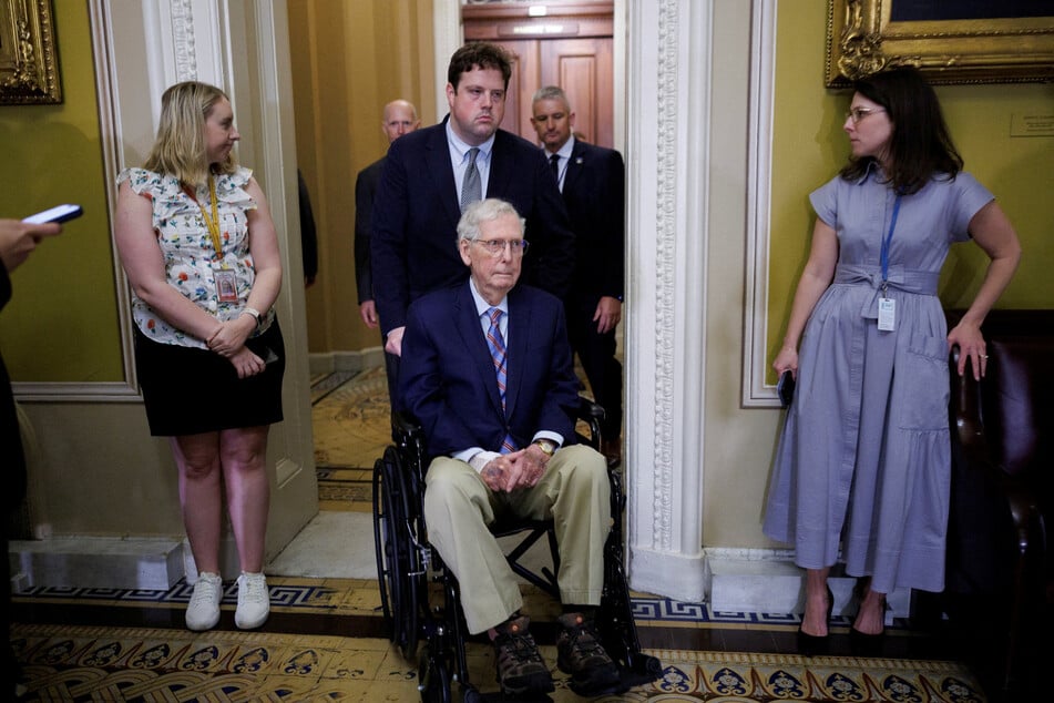 Senator Mitch McConnell is taken into a weekly policy lunch on Capitol Hill on May 19, 2026.
