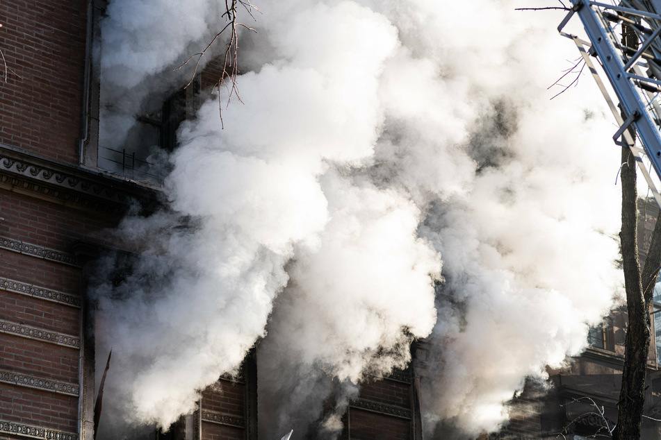 Seventeen firefighters hospitalized battling building blaze in New York