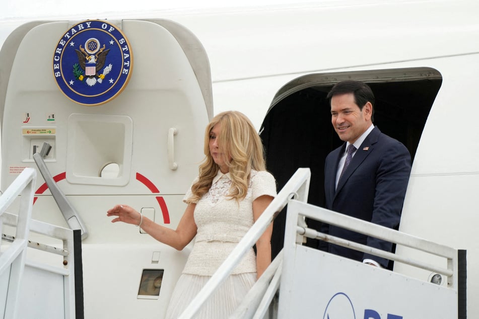 US Secretary of State Marco Rubio and his wife, Jeanette Rubio, disembark at the international airport Ernesto Cortissoz in Barranquilla, Colombia, on September 8, 2026.