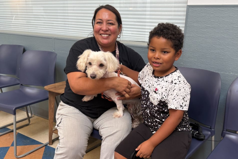 Cindy and Gregory are thrilled to have their dog Colby back at last.