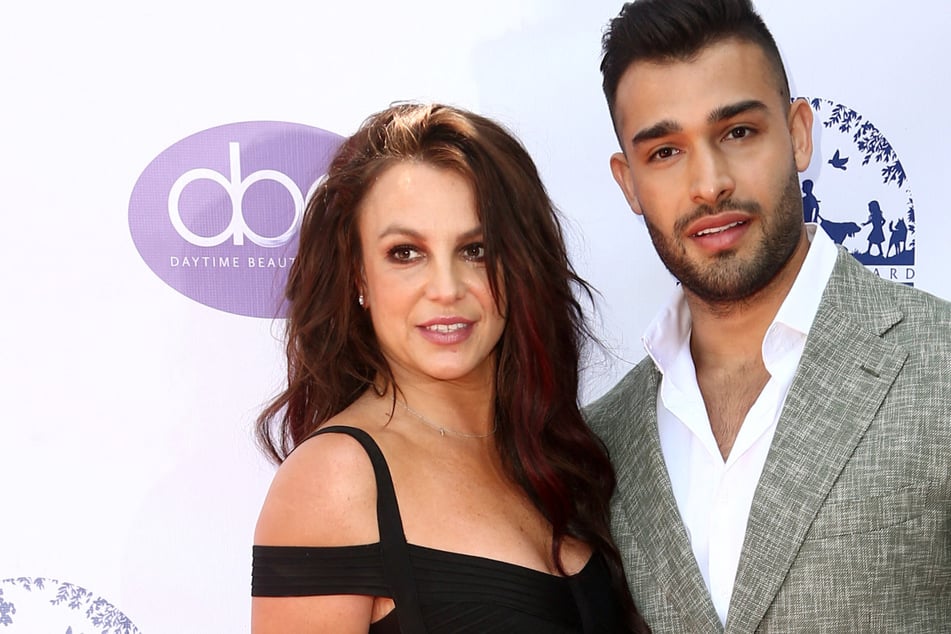 Sam Asghari (r.) opened up about his marriage to Britney Spears in a new podcast appearance.