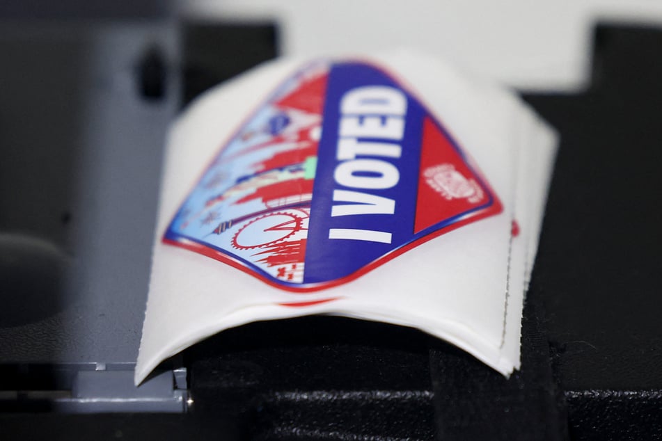 A voter participation sticker sits on a table during early voting in the midterm elections on October 17 in Las Vegas, Nevada. AI technology has made it easier to made fake polls that can influence elections.