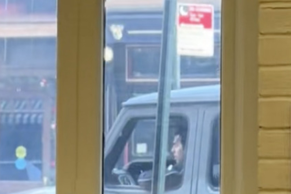 Joe Jonas desperately tried to park his car.