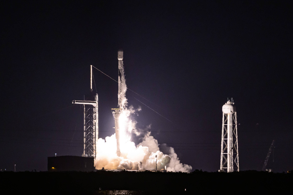 A SpaceX Falcon 9 rocket carrying a classified X-37B military space plane lifts off at Kennedy Space Center in Florida on August 21, 2025.