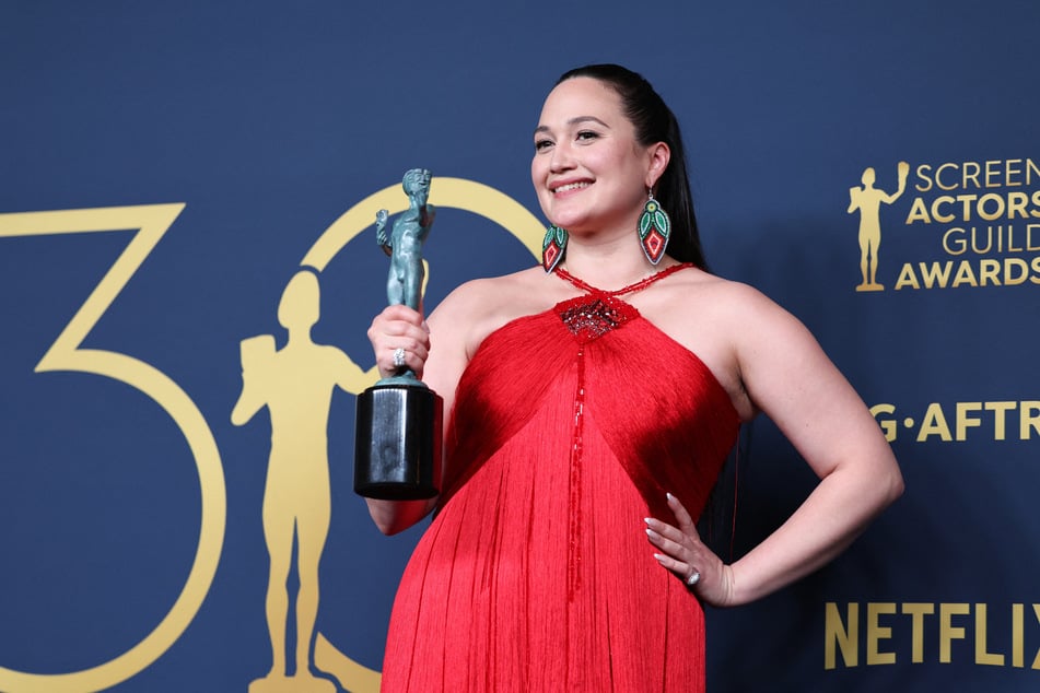 Lily Gladstone poses with the award for best Female Actor in a Leading Role for Killers of the Flower Moon at the 30th Screen Actors Guild Awards.