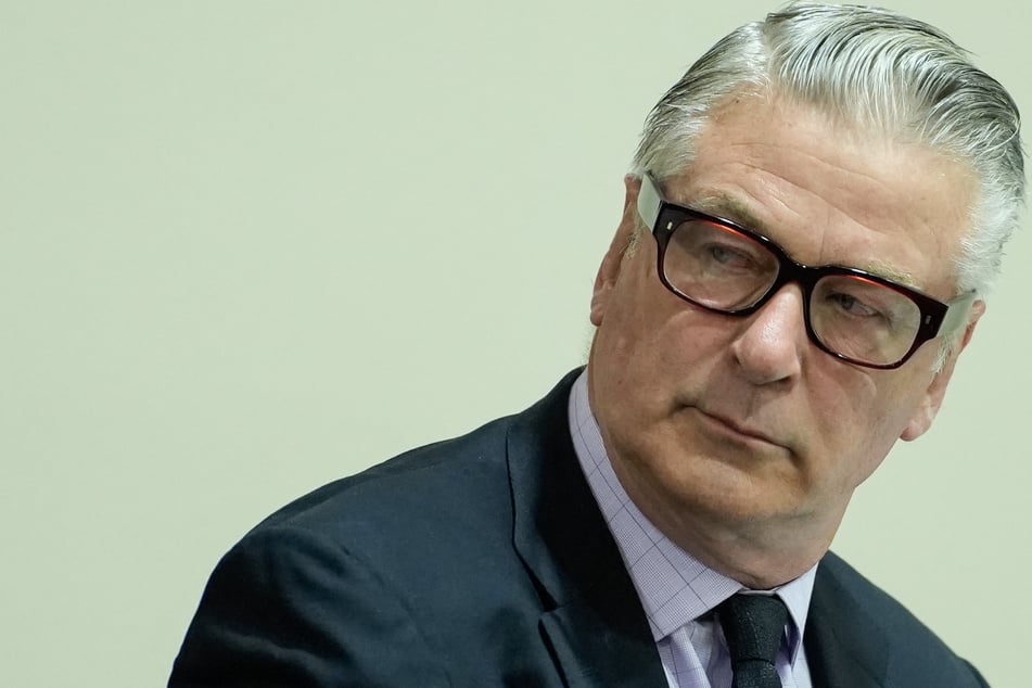 Alec Baldwin Rust trial paused as lawyers file to dismiss over "buried" bullets