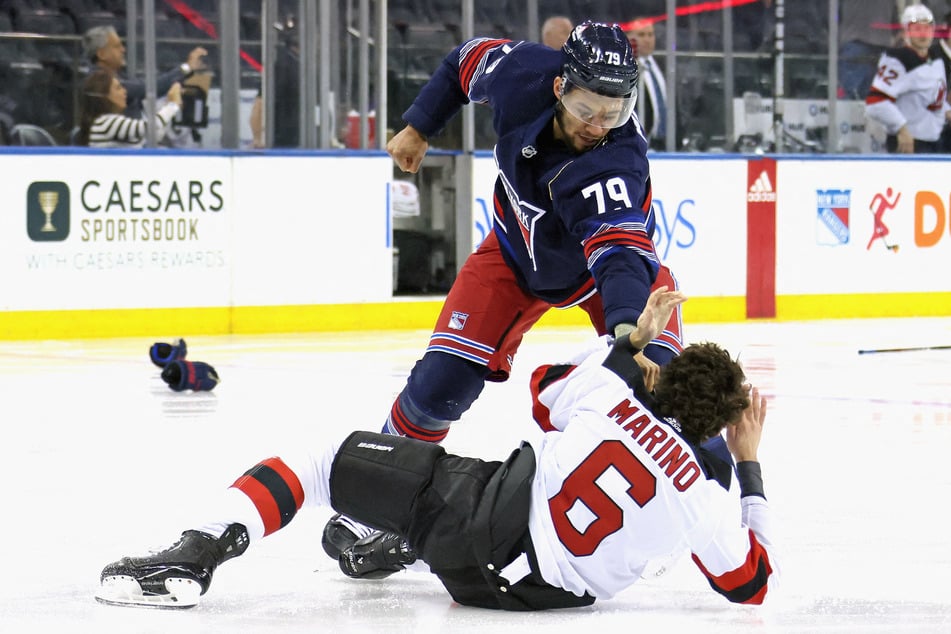 Eight players were ejected after an opening brawl at Wednesday's showdown between the New York Rangers and New Jersey Devils.