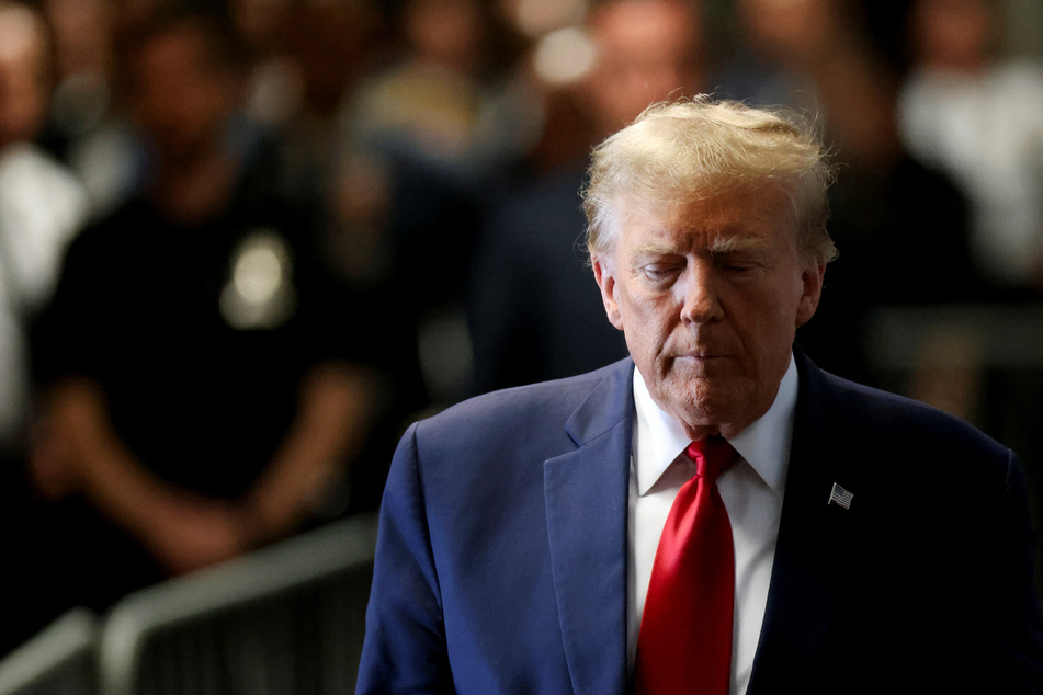 Donald Trump arrives on the day of a court hearing on charges of falsifying business records to cover up a hush money payment to a porn star before the 2016 election.