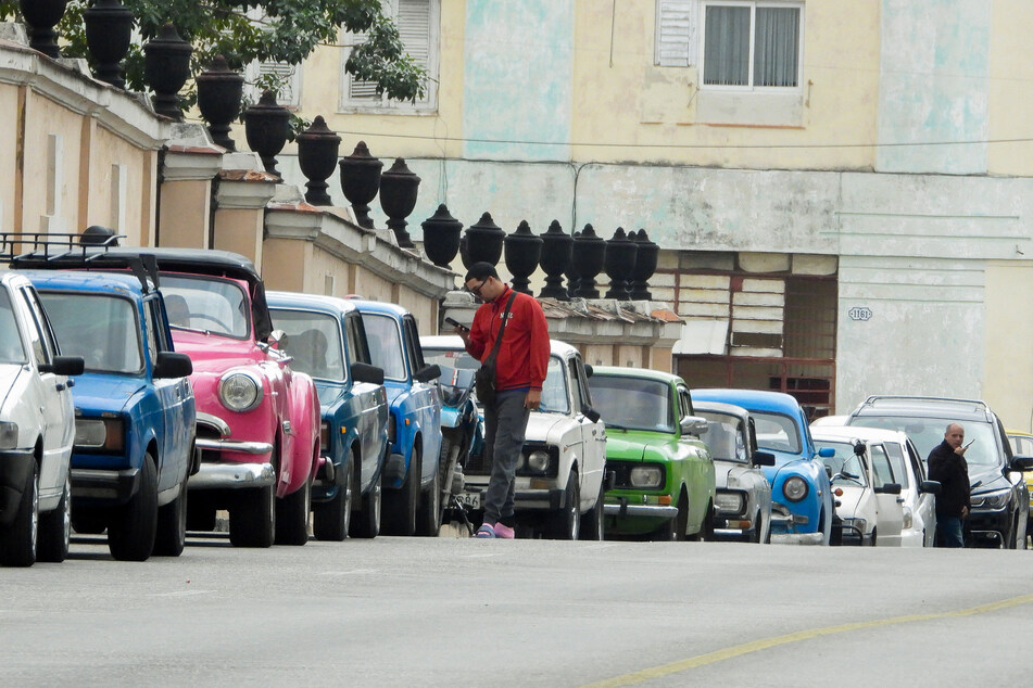 Vehicles wait in line to refuel at a gas station in Havana on January 30, 2026.