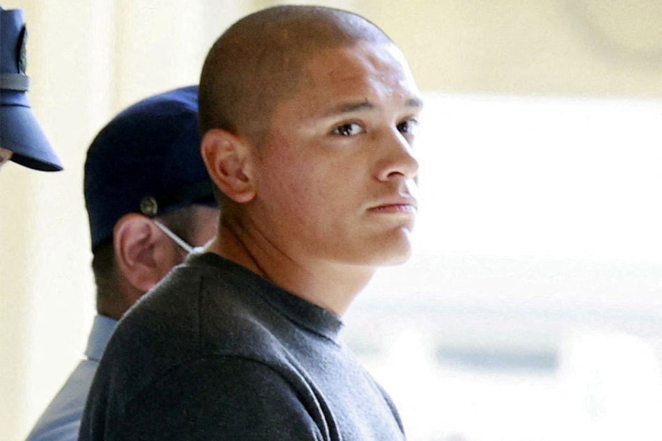 US Marine Lance Corporal Devin Jacob Ballard leaves a police station to be sent to prosecutors over the killing of a Japanese woman in Naha, Okinawa Prefecture, on October 5, 2026. 
