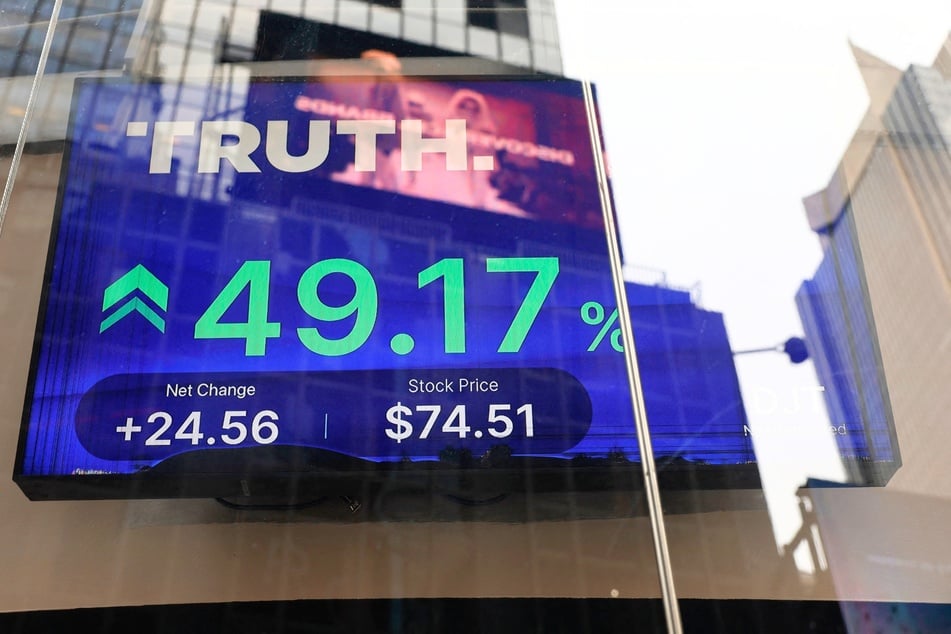 Trump Media & Technology Group stock market trading information seen on a television at the Nasdaq Marketplace in New York City on March 26, 2024.