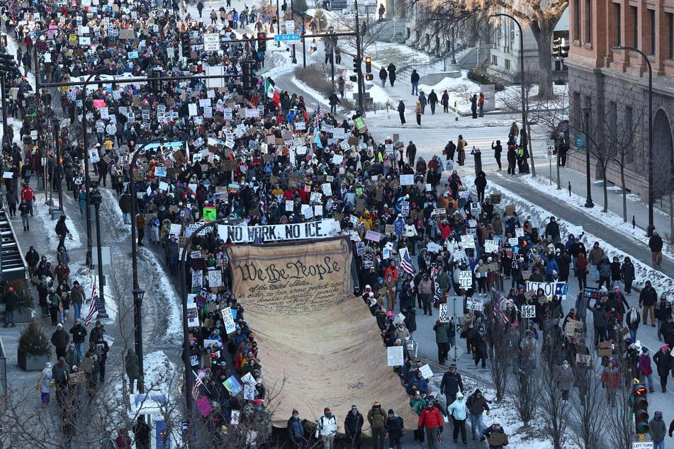 Thousands of people turned out to protest and resits President Donald Trump's occupation of Minneapolis on Friday.