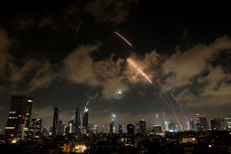 Iran says it fired hypersonic missiles at Israel after Trump demands "unconditional surrender"