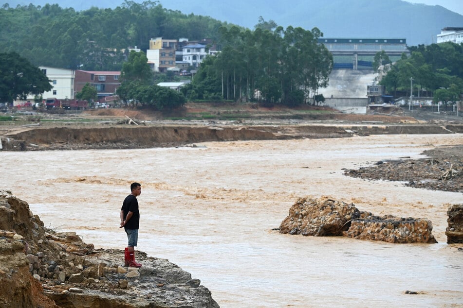 Severe flooding has caused zoo animals to escape and reservoirs to collapse in China’s southwest Guangxi region.