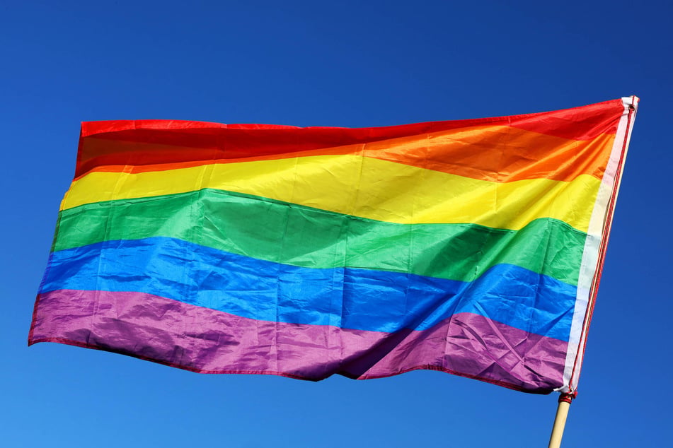 A former FBI employee has filed suit after he was fired for displaying a gay pride flag at his desk which had been flown by the bureau at its Los Angeles field office.