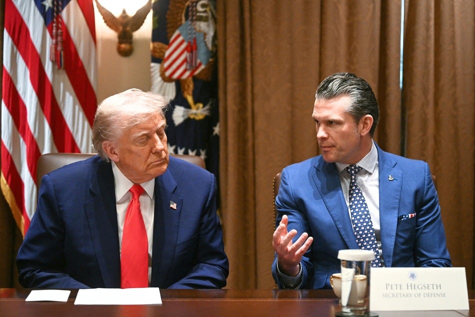 A recent report claimed President Donald Trump (l.) has begun the process of seeking a replacement for his Defense Secretary, Pete Hegseth.