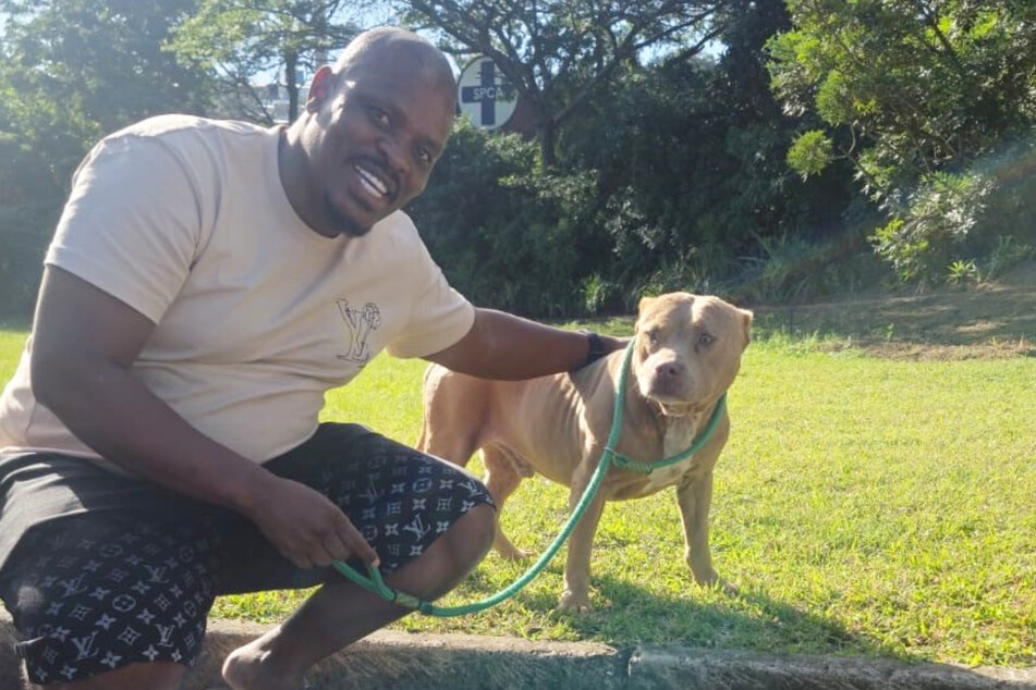 The dog owner can hardly believe his luck.