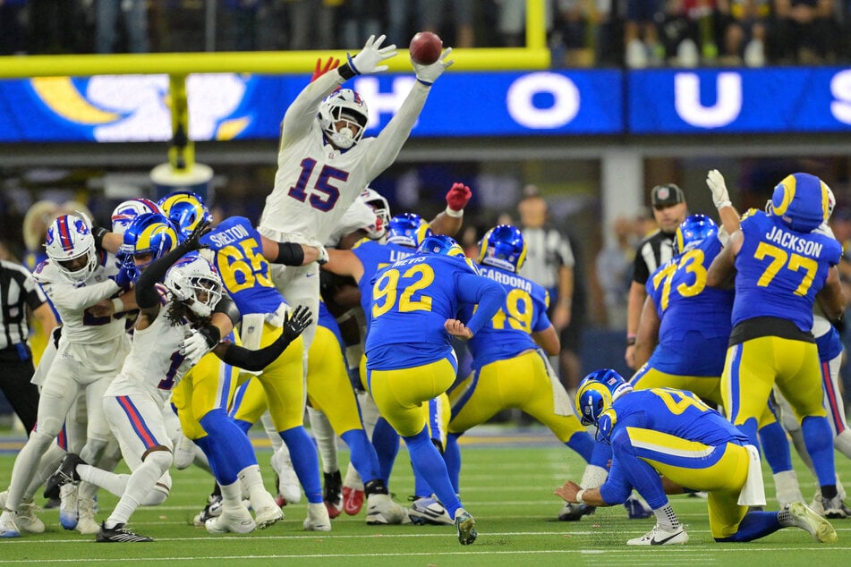 Buffalo Bills linebacker Greg Rousseau blocks a field goal from Los Angeles Rams place kicker Harrison Mevis during overtime at SoFi Stadium.
