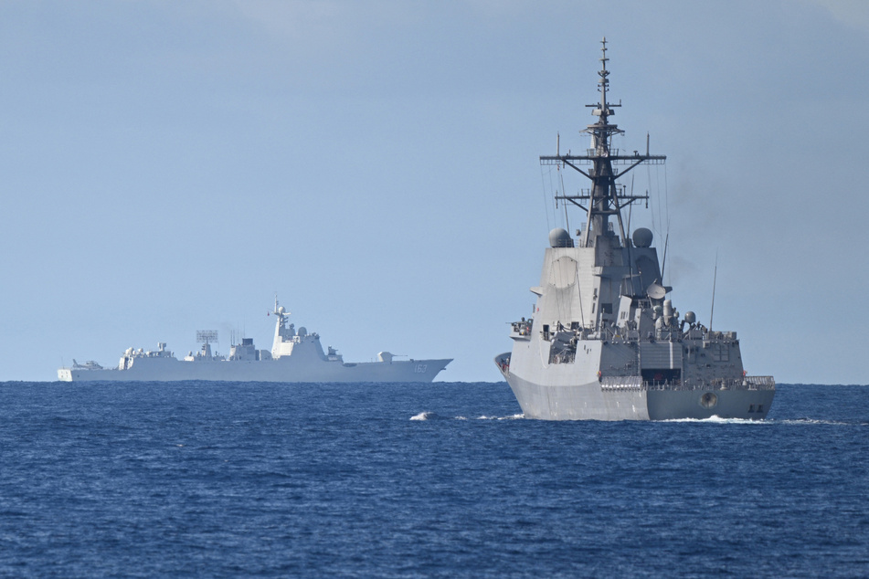 A Chinese Navy ship shadows a Royal Australian Navy destroyer taking part in joint cooperative activities with the Filipino and Canadian Navy at the disputed Scarborough Shoal last year.
