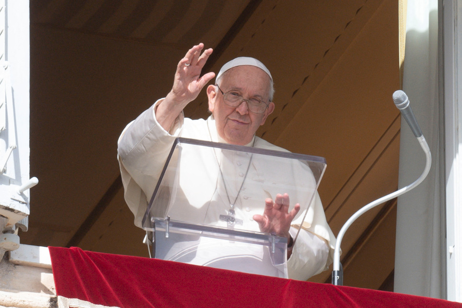 Pope Francis leads the Angelus prayer from his window at the Vatican on November 5, 2023.