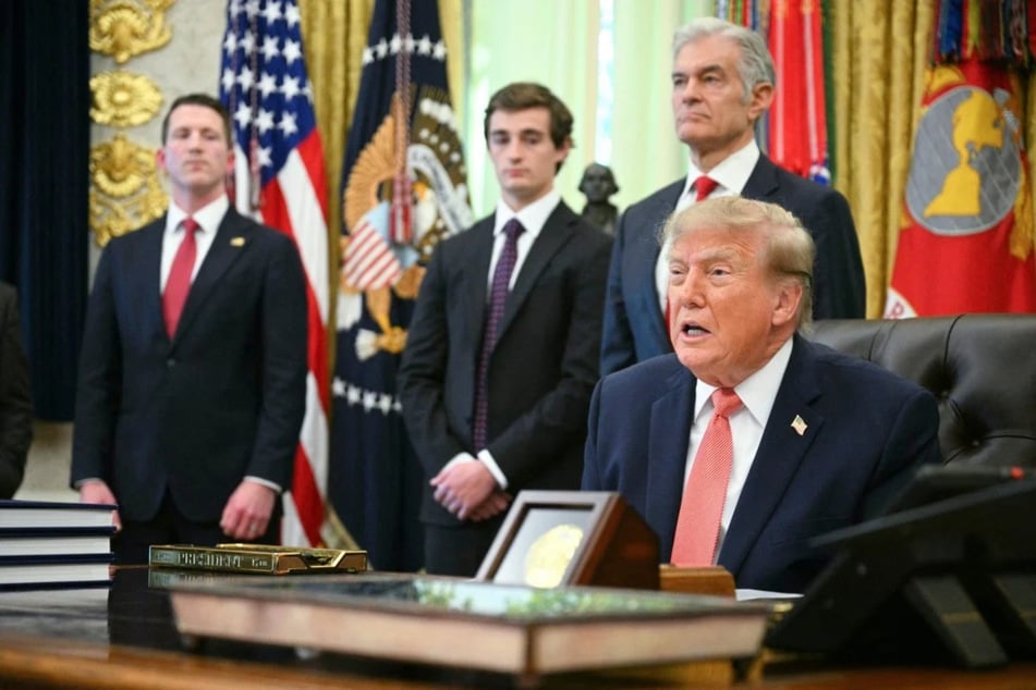 President Donald Trump making an announcement on fraud in the Oval Office of the White House in Washington DC on October 20, 2026. He launched a whistleblower incentive program and awarded MAGA journalist Nick Shirley with a $10,000 check.
