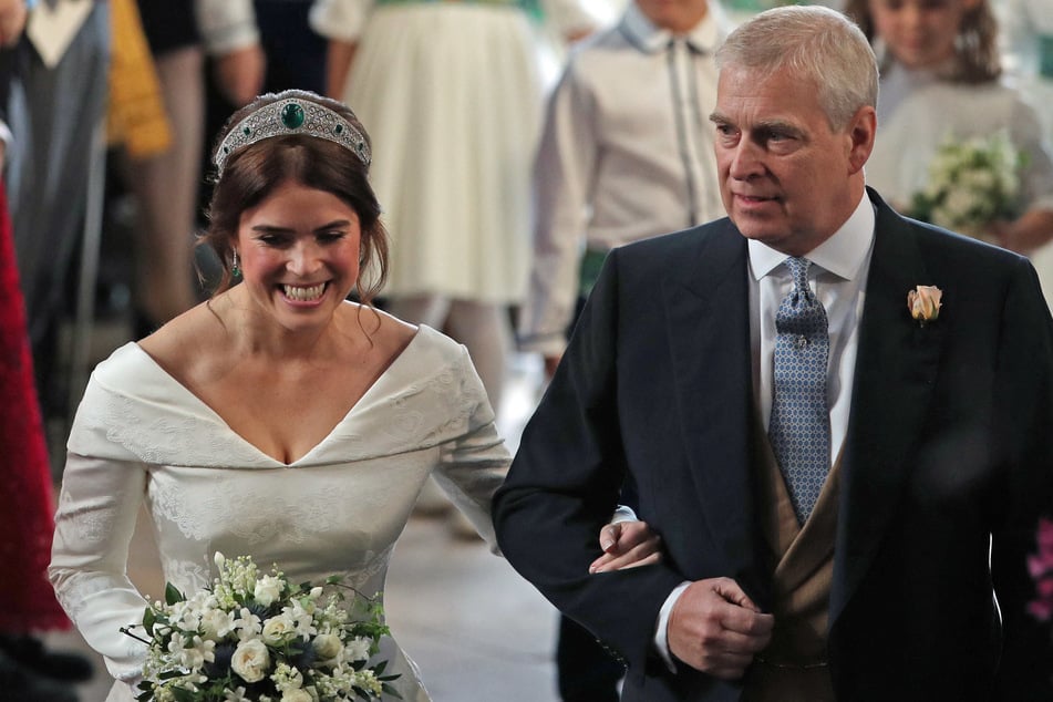 Princess Eugenie (l.) has suffered some of the repercussions from her father Andrew's explosive scandals.