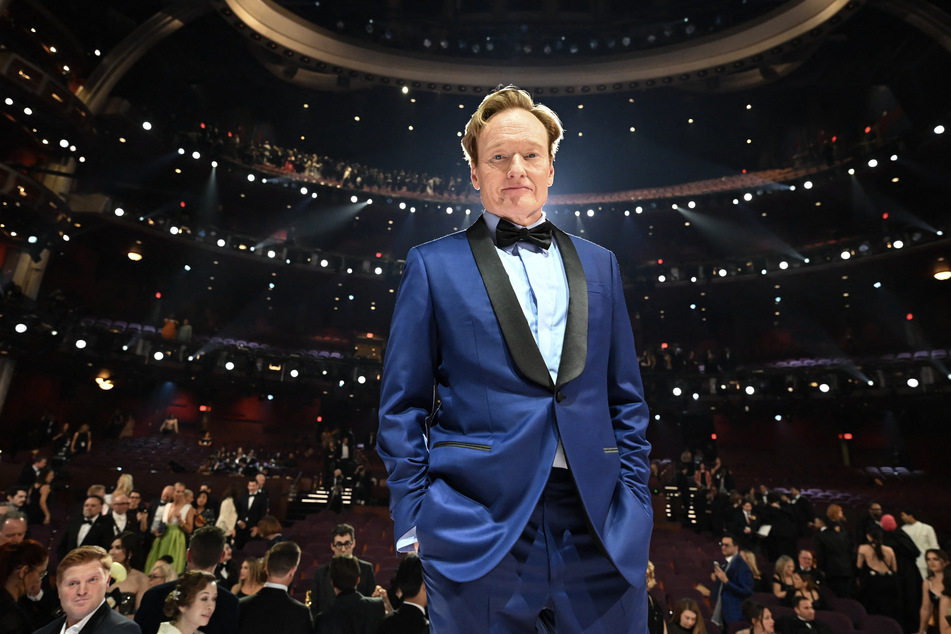 This handout picture courtesy of the Academy of Motion Picture Arts and Sciences (AMPAS) shows US comedian and host Conan O'Brien posing for a photo at the end of the 97th Annual Academy Awards at the Dolby Theatre in Hollywood, California on March 2, 2025.