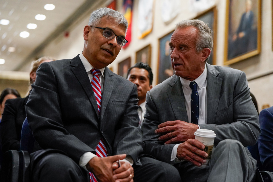 NIH Director Jay Bhattacharya (l.) contradicted Health Secretary Robert F. Kennedy Jr.'s timeline to solve the cause of autism by September.
