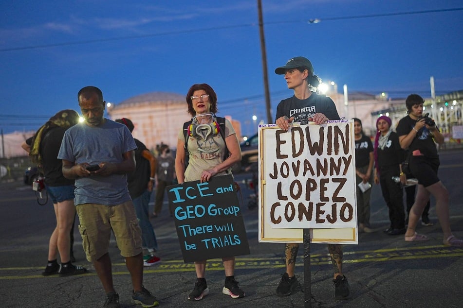 Protesters hold a vigil outside Newark's Delaney Hall Detention Camp after Edwin Lopez-Cornejo died while in US Immigration and Customs Enforcement custody on Saturday.