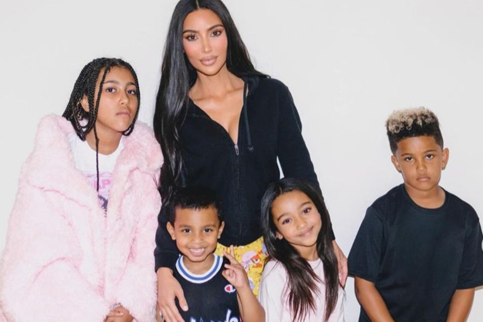 Kim Kardashian (c.) got honest about her kids calling her "embarrassing" after North West hung up on her.