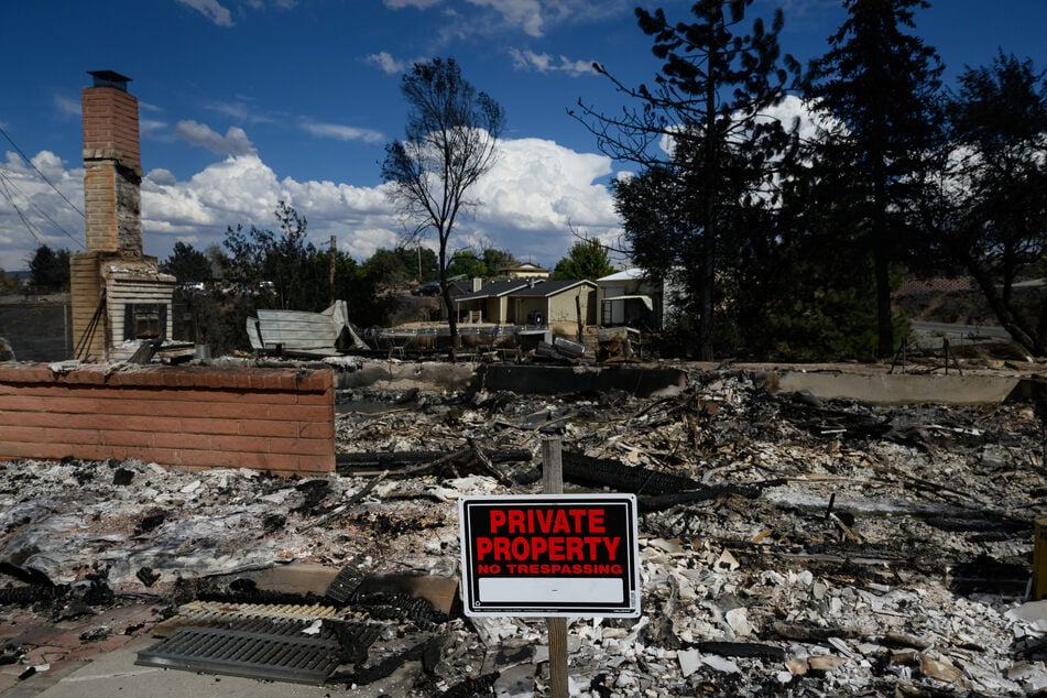 A burned home smolders after it was destroyed by the Hawk Fire in Reno, Nevada, on August 24, 2026.