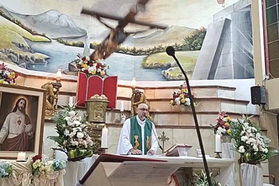 A heavy crucifix fell onto the priest during the service. He ultimately succumbed to his injuries.