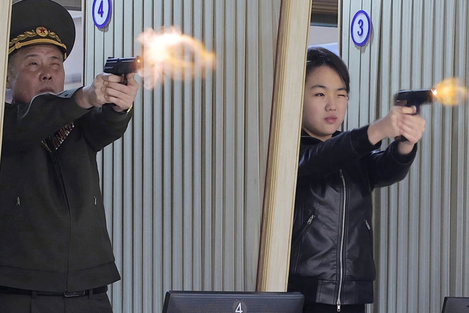 North Korean leader Kim Jong-un's daughter Ju Ae was pictured firing a pistol at a shooting range.