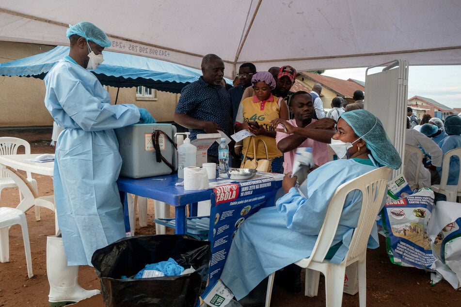 Health workers and humanitarian responders gather to receive a vaccination due to their potential exposure to the Ebola virus in the North Kivu Province of the Democratic Republic of the Congo on October 16, 2026.